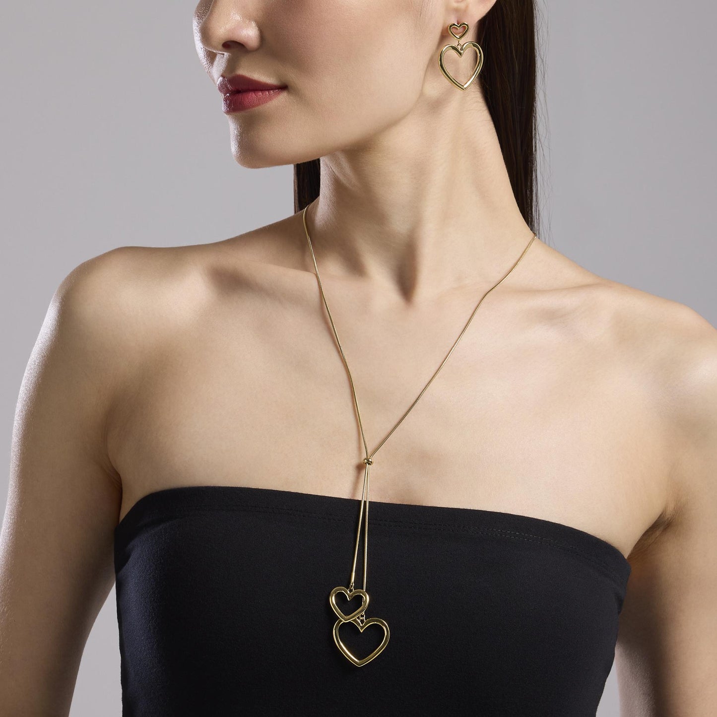 Orecchini Kidult Style Doppio cuore pendente gold