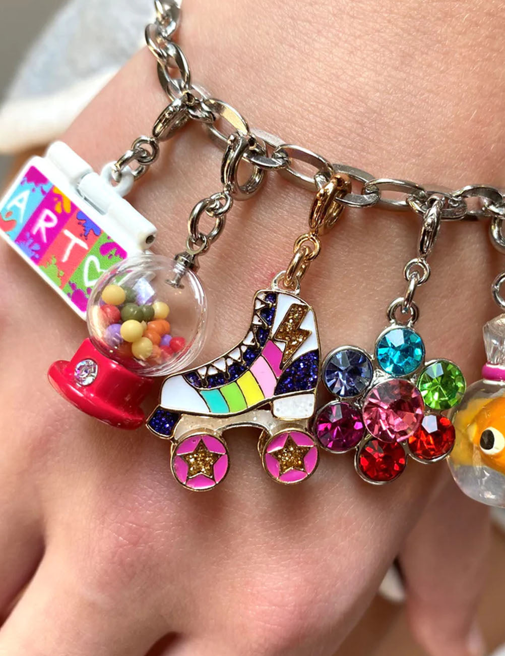 Ciondolo CharmIT! Pattini a rotelle d’oro