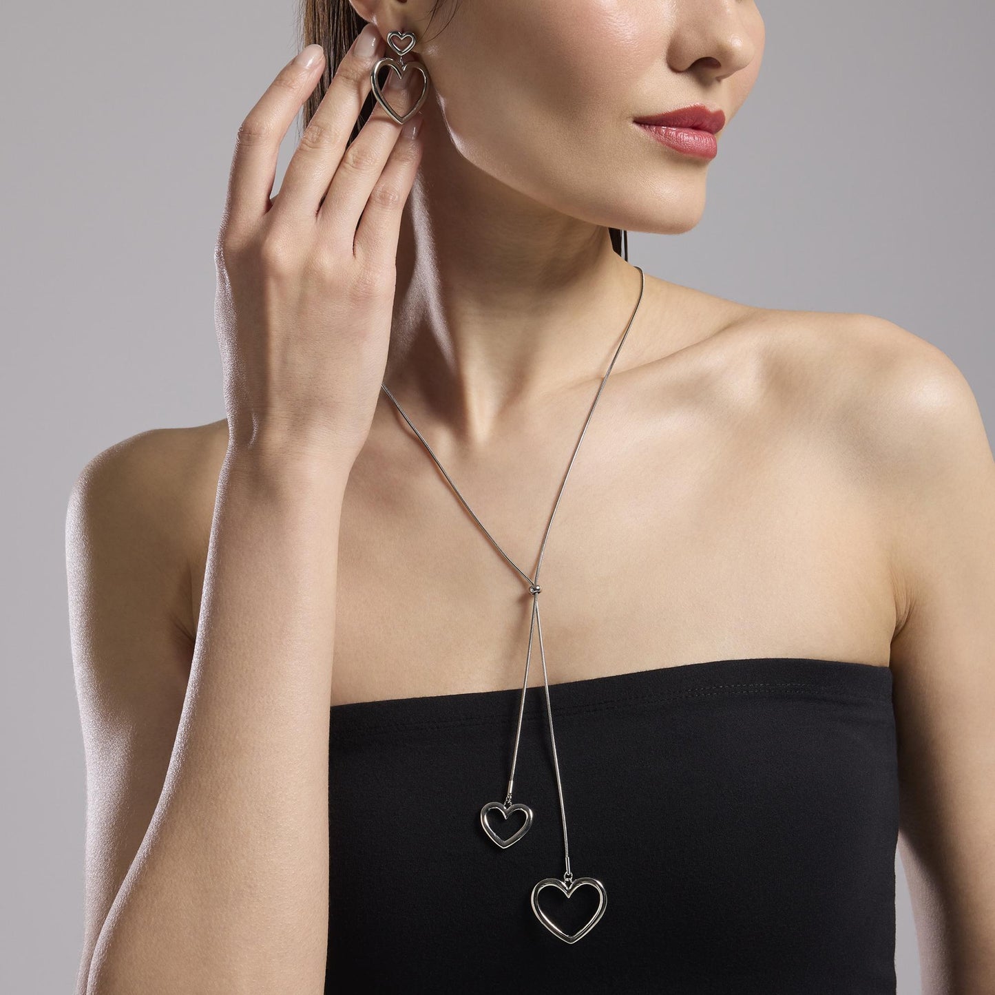 Orecchini Kidult Style 15 Doppio cuore pendente