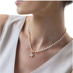 Collana Vestopazzo Sfere bianche e stella madreperla