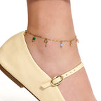 Cavigliera donna Kidult in acciaio dorato con charms estivi