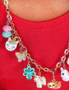 Ciondolo CharmIT! Pavone girevole in oro