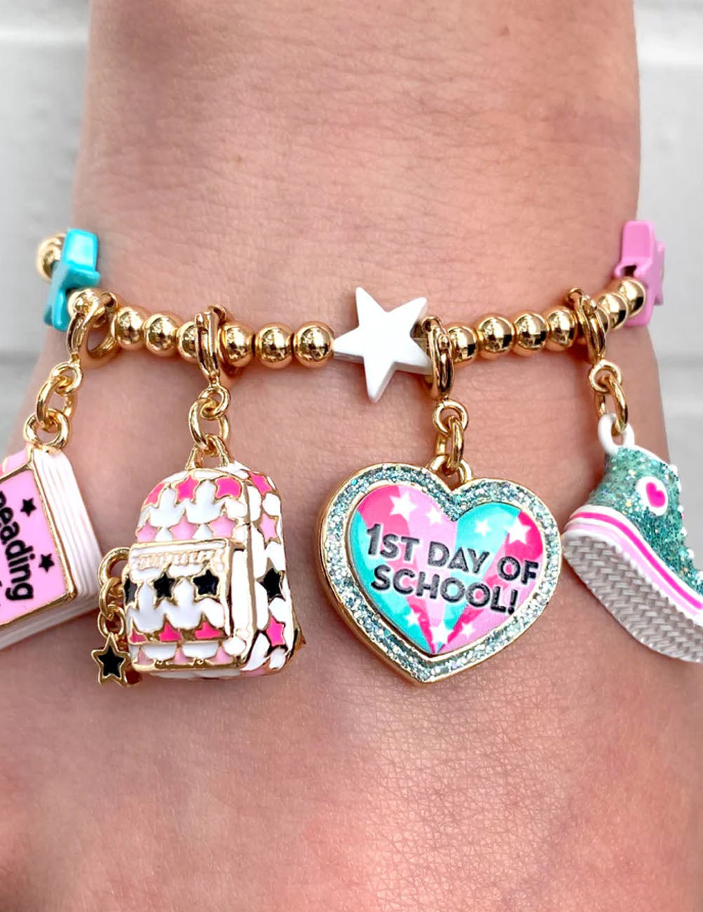 Bracciale CharmIT! Perline multi-stella gold