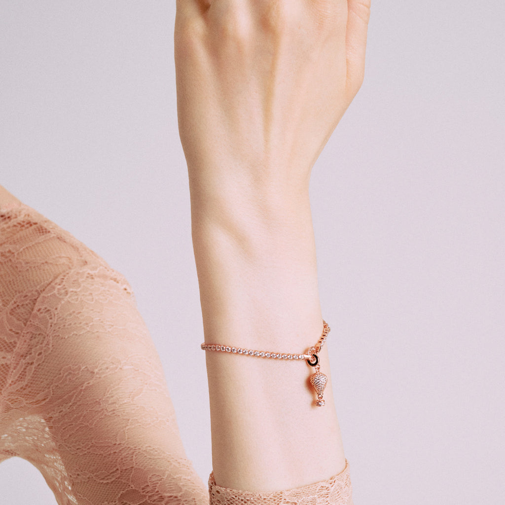 Charm Rosato Storie Mongolfiera rosè, zirconi e smalto bianco