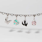 Charm Rosato Storie Margherita con zirconi e smalto turchese